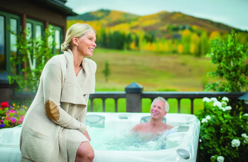 10 Life-Changing Hot Tub Soak Benefits (And Why You Need One Today) - Hot Tub Central NJ Uncategorized an elderly couple enjoying time in the hot tub after working in the garden
